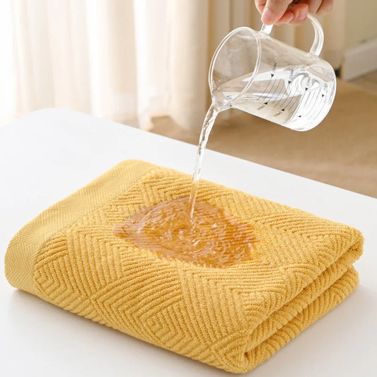 Serviette de bain en coton jaune