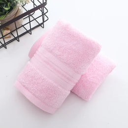 Serviette de bain rose poudré